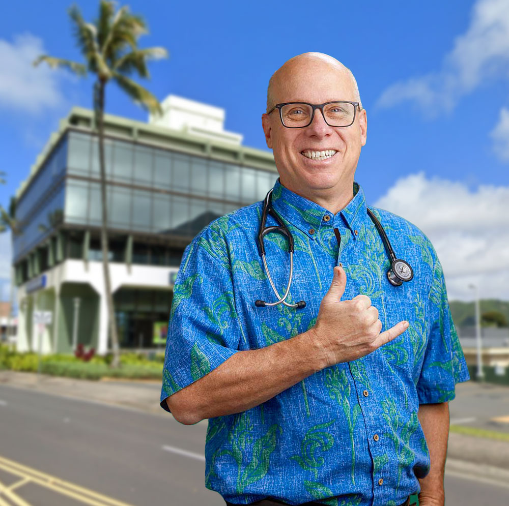 Dr. Scott in front of PMG office building